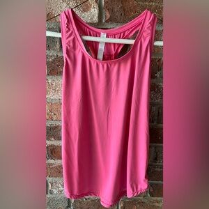 /ululemon Essential Tank Top Pleated in the color Sonic Pink. Size 8